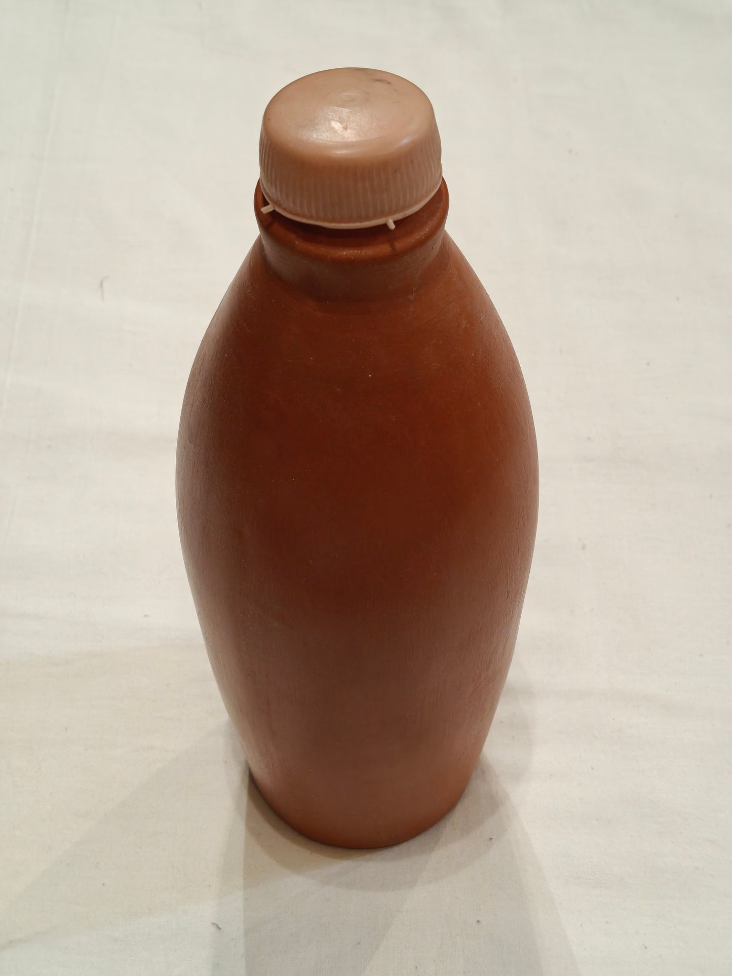 Handcrafted bottle made of clay