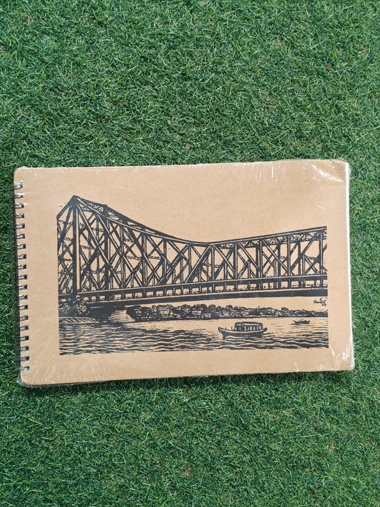 Hand made paper sketchbook with brown board cover and spiral binded