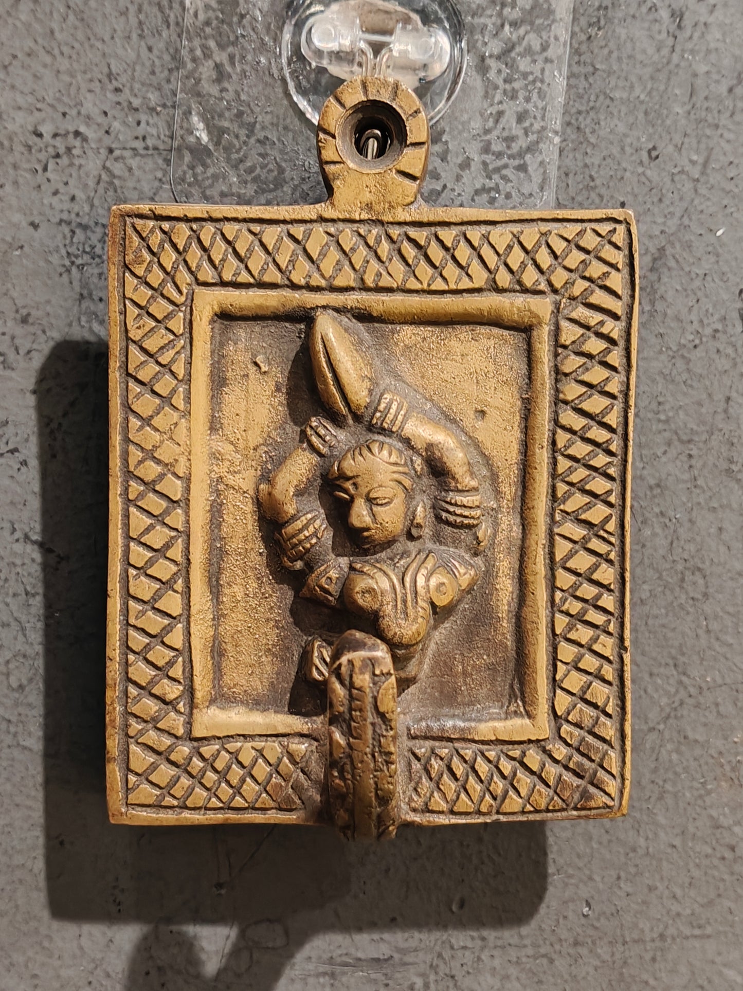 Handcrafted  hangers with figures carved on it - brass