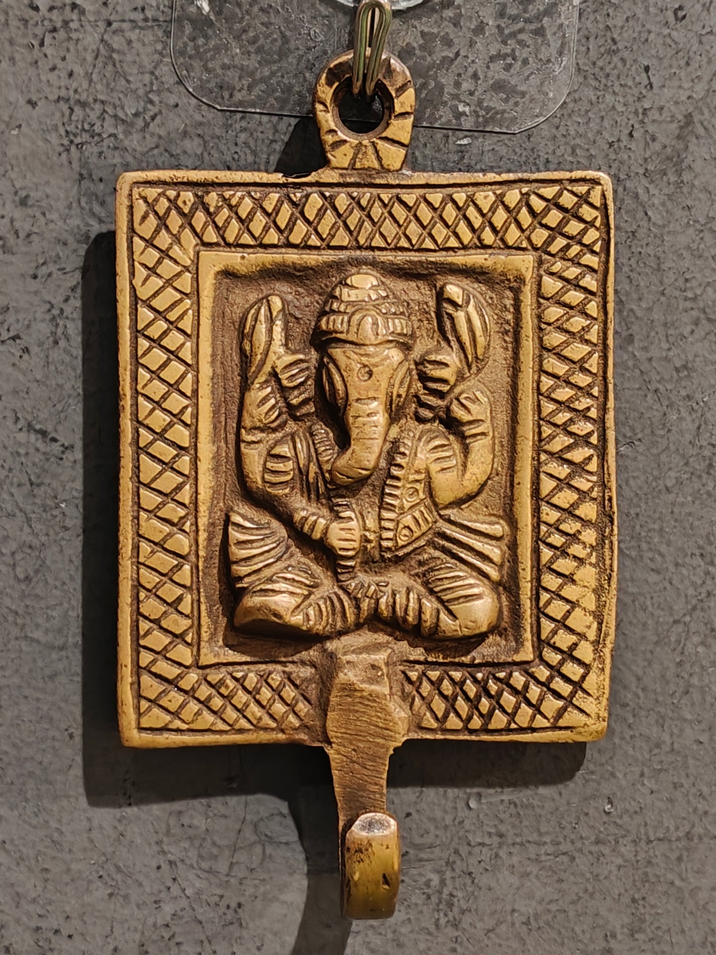 Handcrafted  hangers with figures carved on it - brass