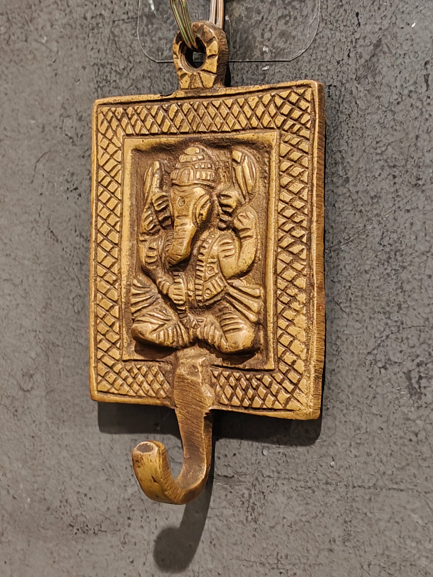 Handcrafted  hangers with figures carved on it - brass