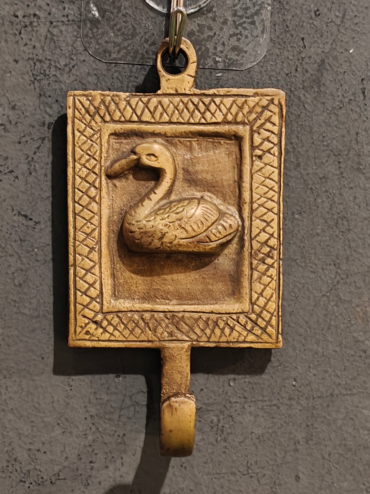 Handcrafted  hangers with figures carved on it - brass