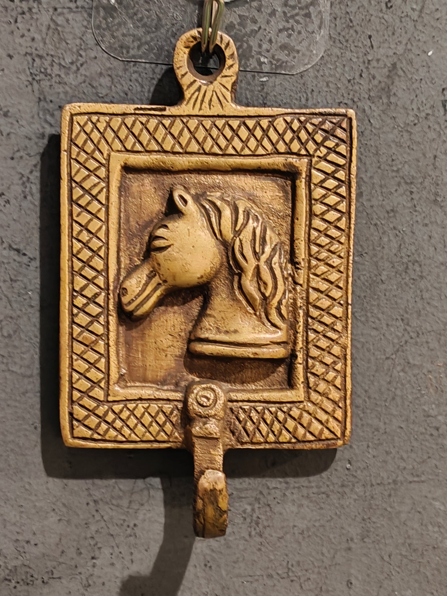 Handcrafted  hangers with figures carved on it - brass