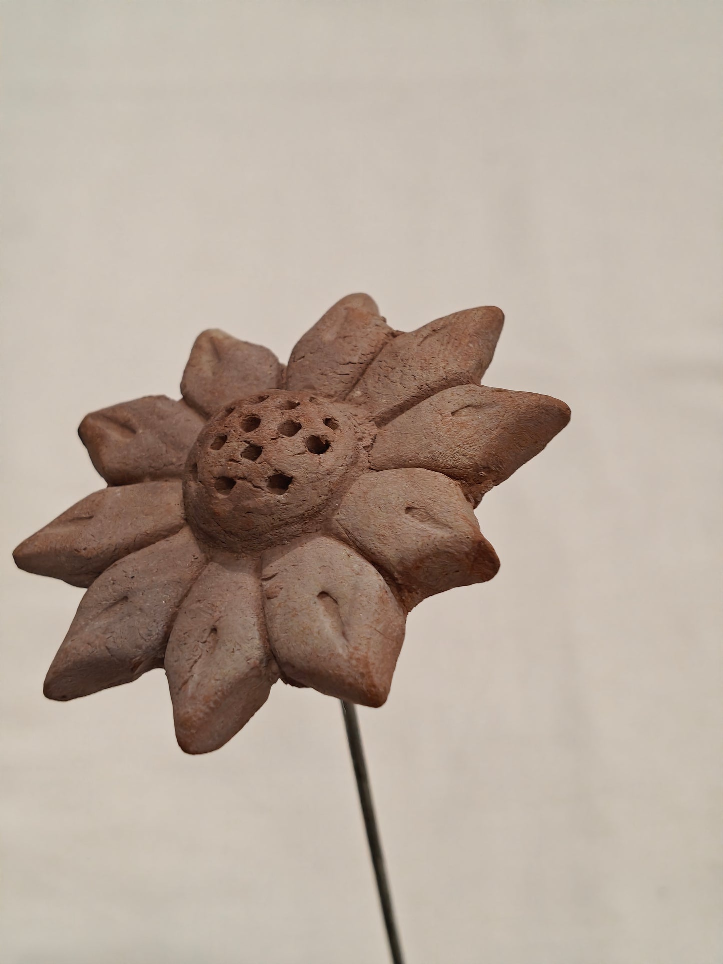 Handcrafted with clay garden stick