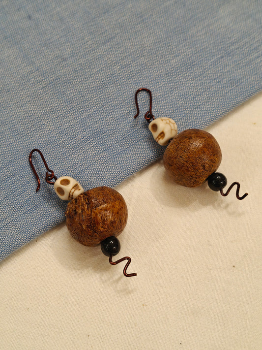 Earrings with wooden bead and skull shaped bead ear hooks