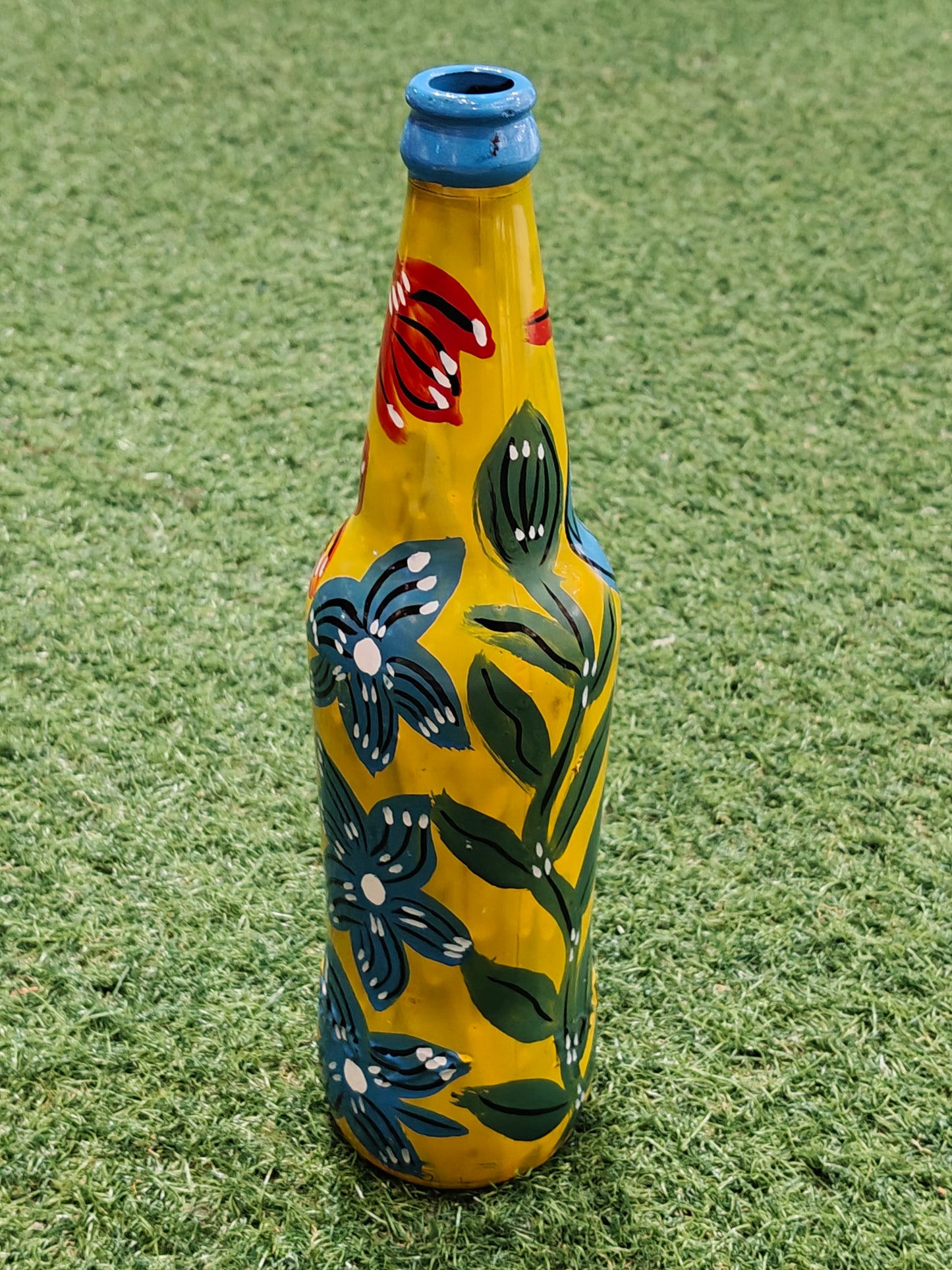 Glass bottle with Handpainted flowers on it -  flower vase