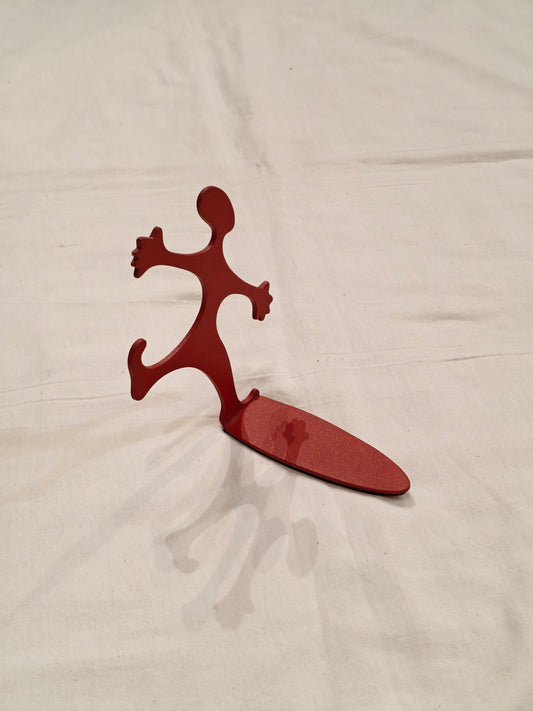 Red coated steel bookends pair - person holding it all design