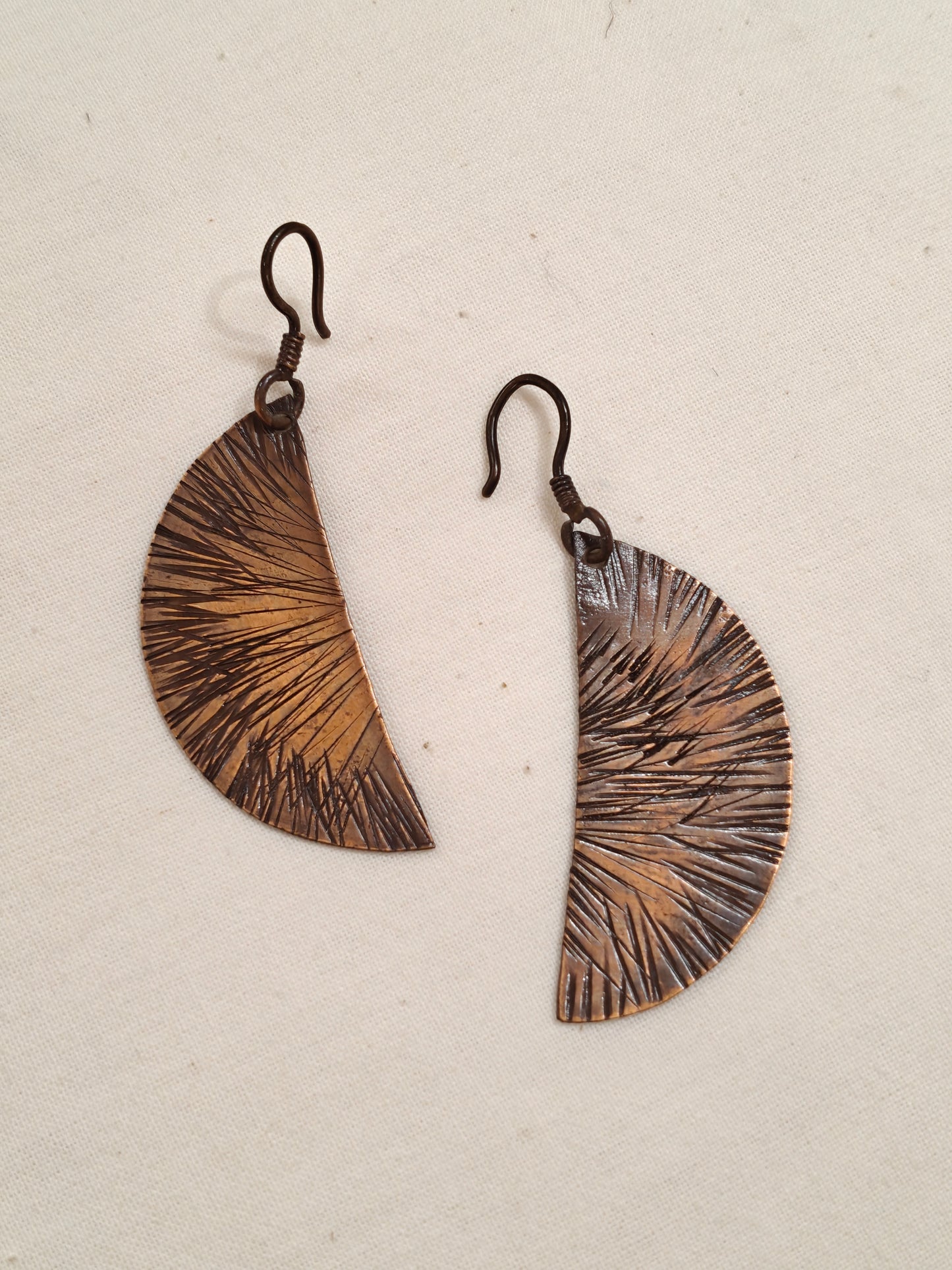 Semi circular copper earrings