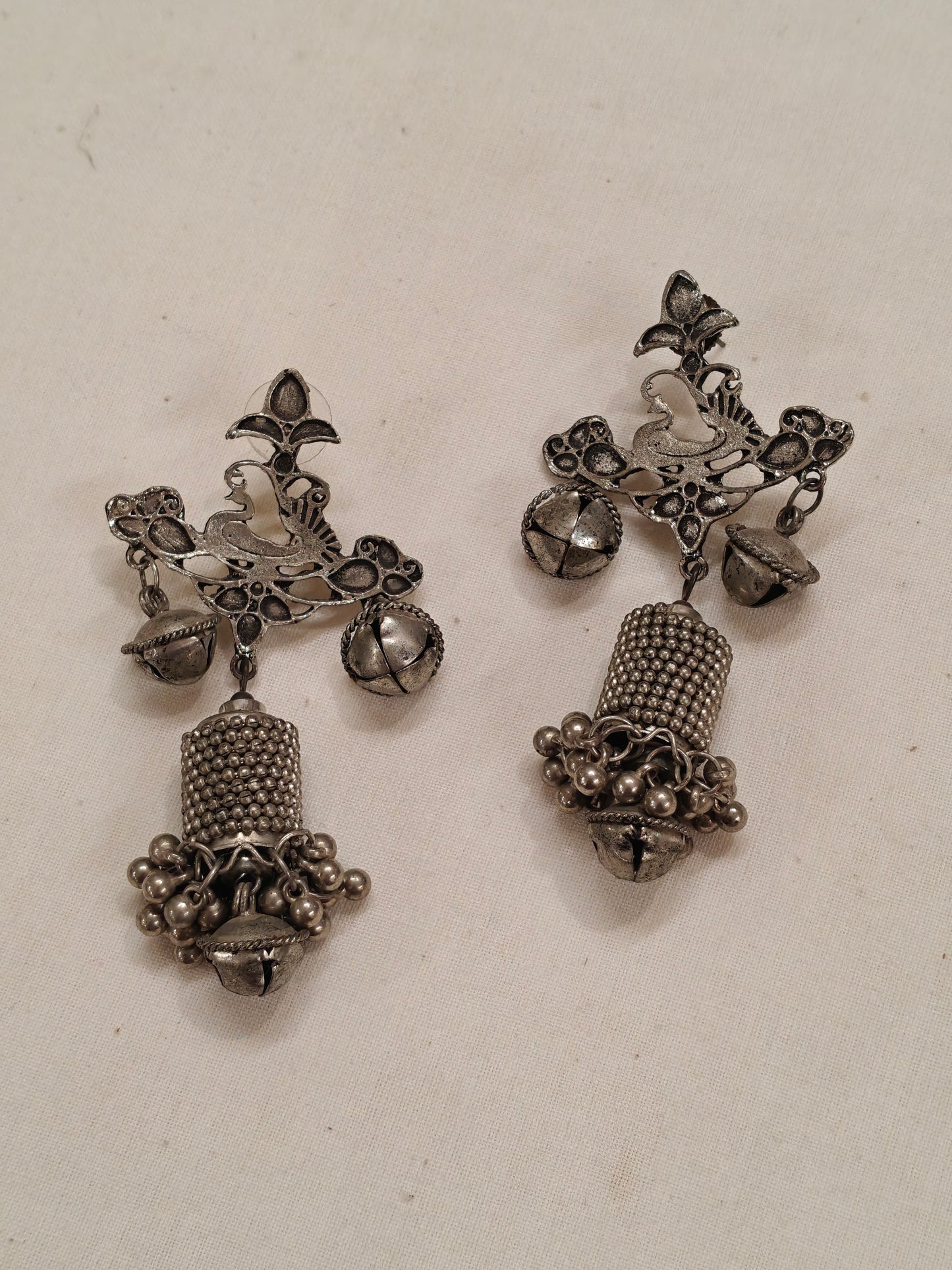 Bird cylindrical shaped with ghungru drops oxidised silver ear rings