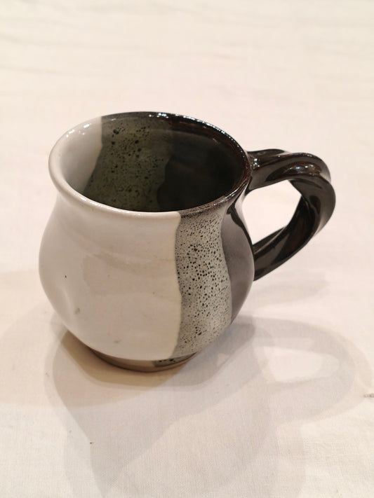 Ceramic white,green and black vertical bands with twisted handle Handcrafted cup