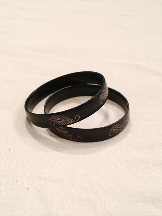Black bidri style silver inlay bangle with leaf designs