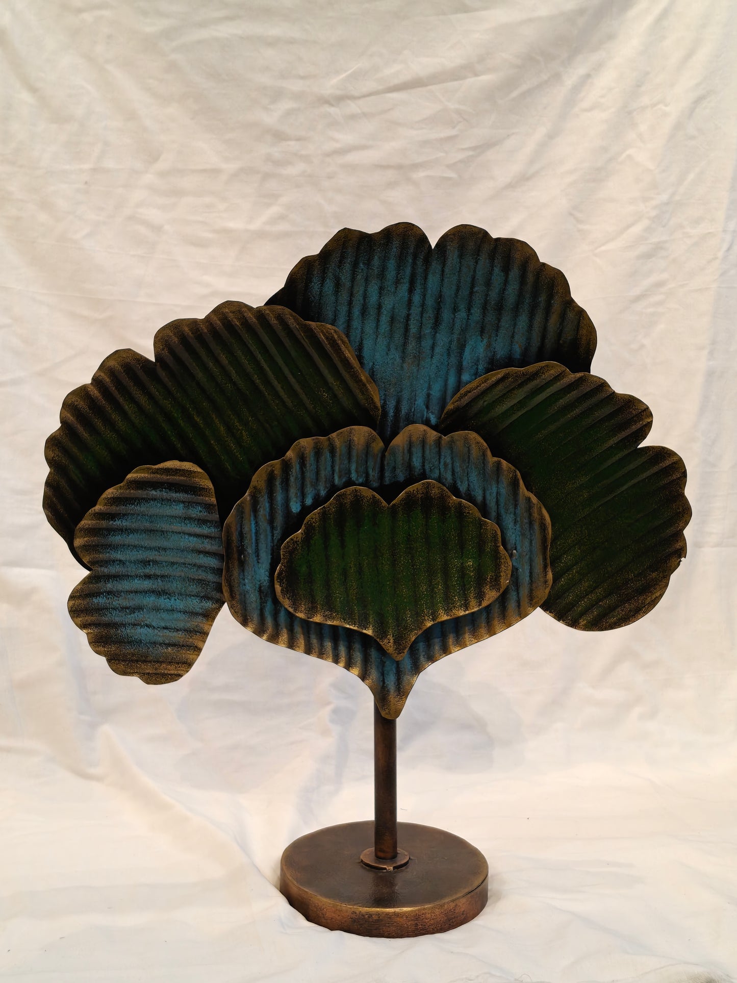 Green blue metal tree with circular base handcrafted decor
