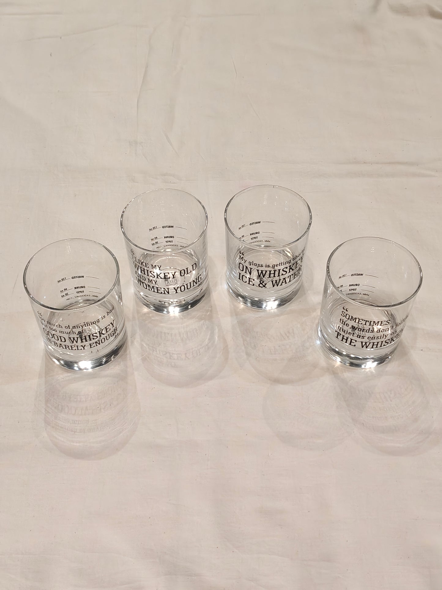 Quirky Whiskey glasses with fun whiskey quotes - set of 4