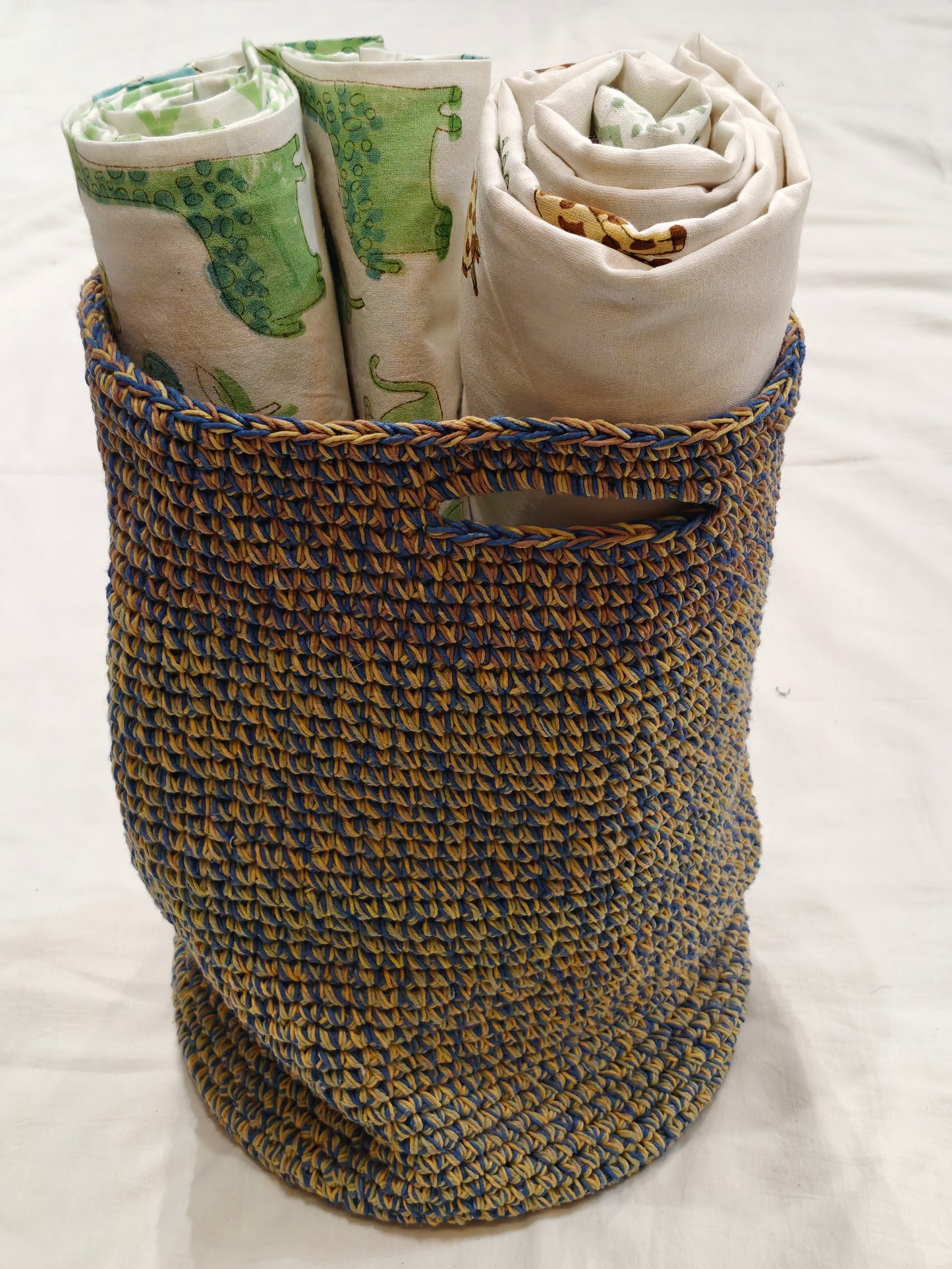 Crochet basket with a circular base metal ring and handle - handcrafted crochet