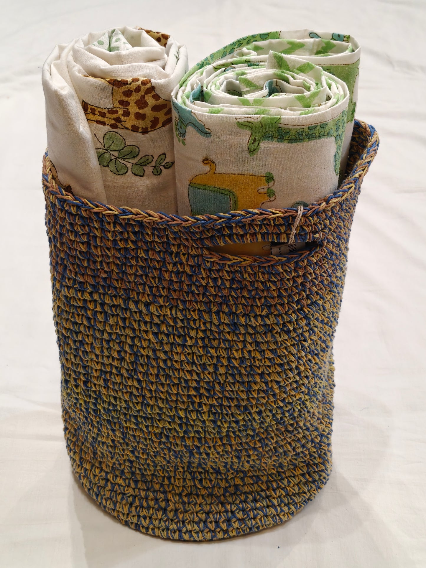 Crochet basket with a circular base metal ring and handle - handcrafted crochet