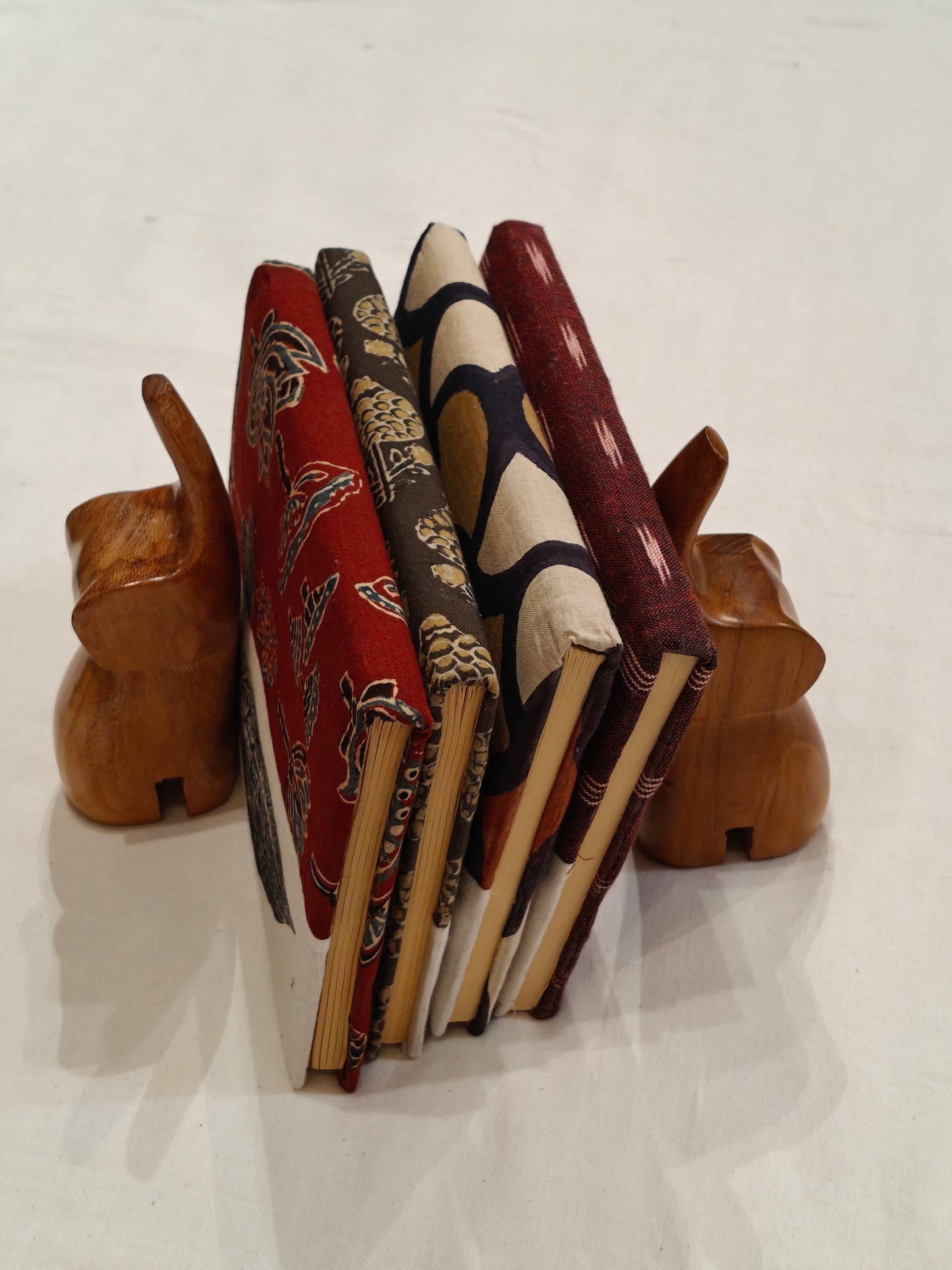 Elephant shaped wooden bookends pair