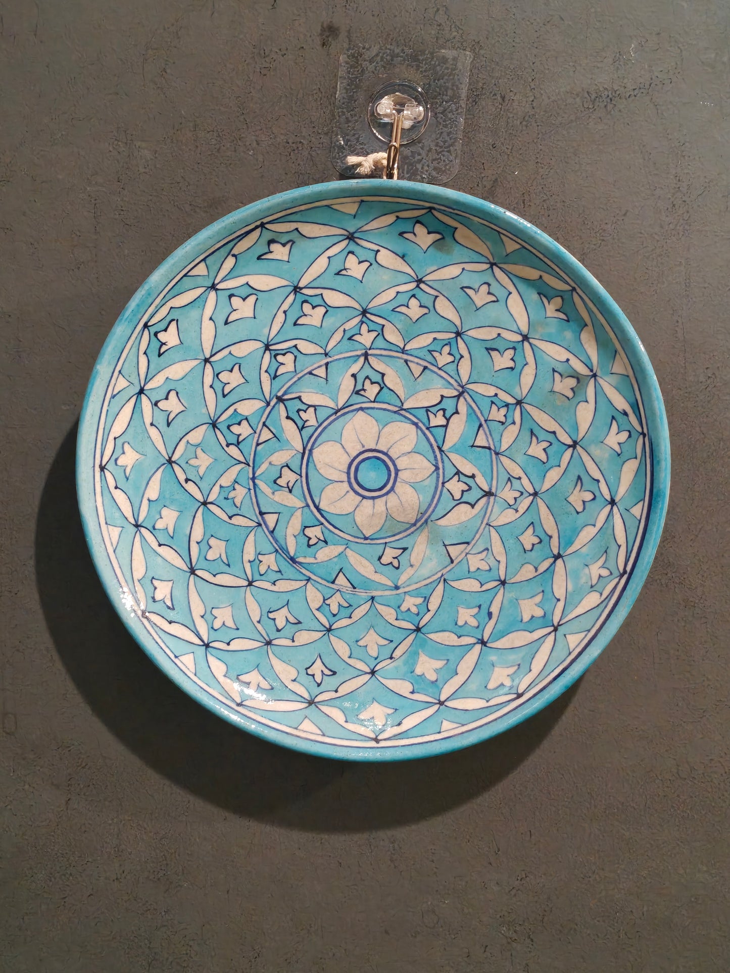 Blue white floral design blue pottery wall plate