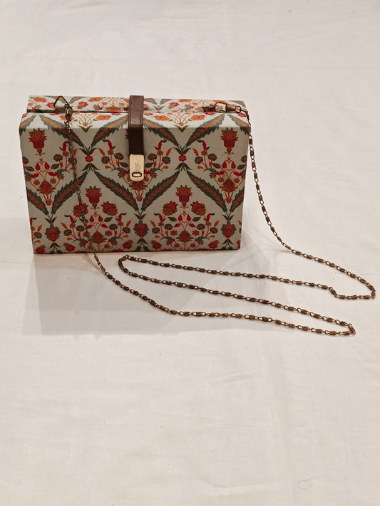 Floral fabric covered chain sling bag