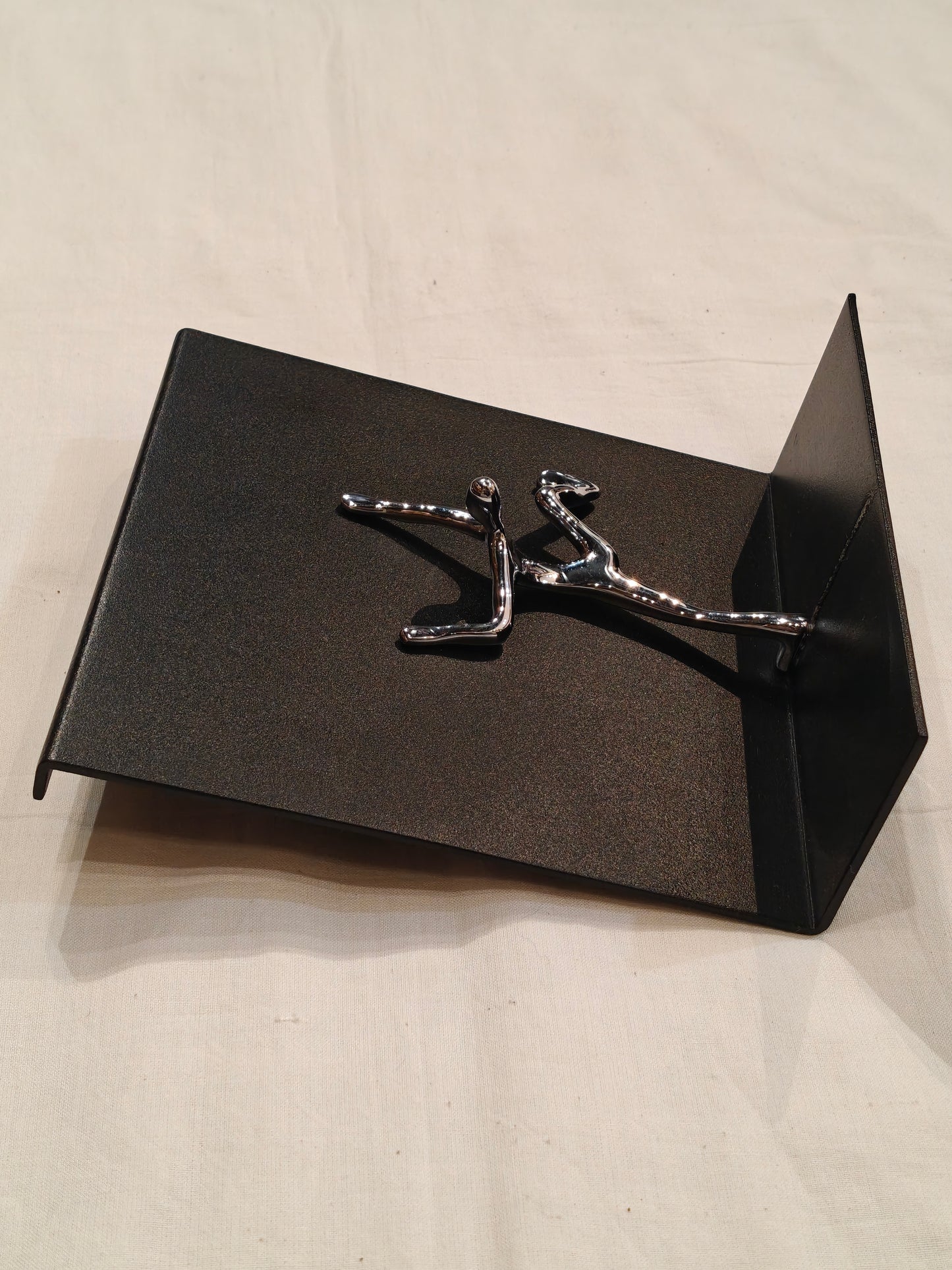 Quirky napkin holder - man all over the place to save your tissues from flying off