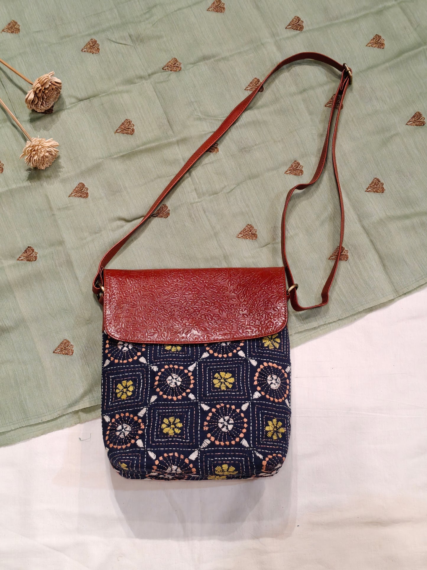 Kantha embroidered fabric with embossed leather flap - hand crafted adjustable length bag