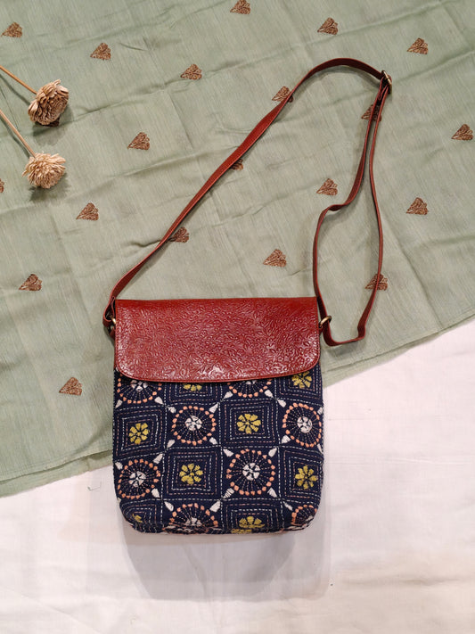 Kantha embroidered fabric with embossed leather flap - hand crafted adjustable length bag