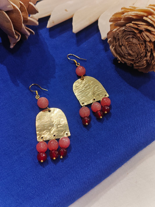 Long semi-circular brass handcrafted hook earrings with peach and red beads