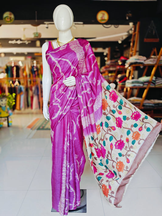 Pink tussar silk saree with needle shibori body and hand painted lotus design pallu