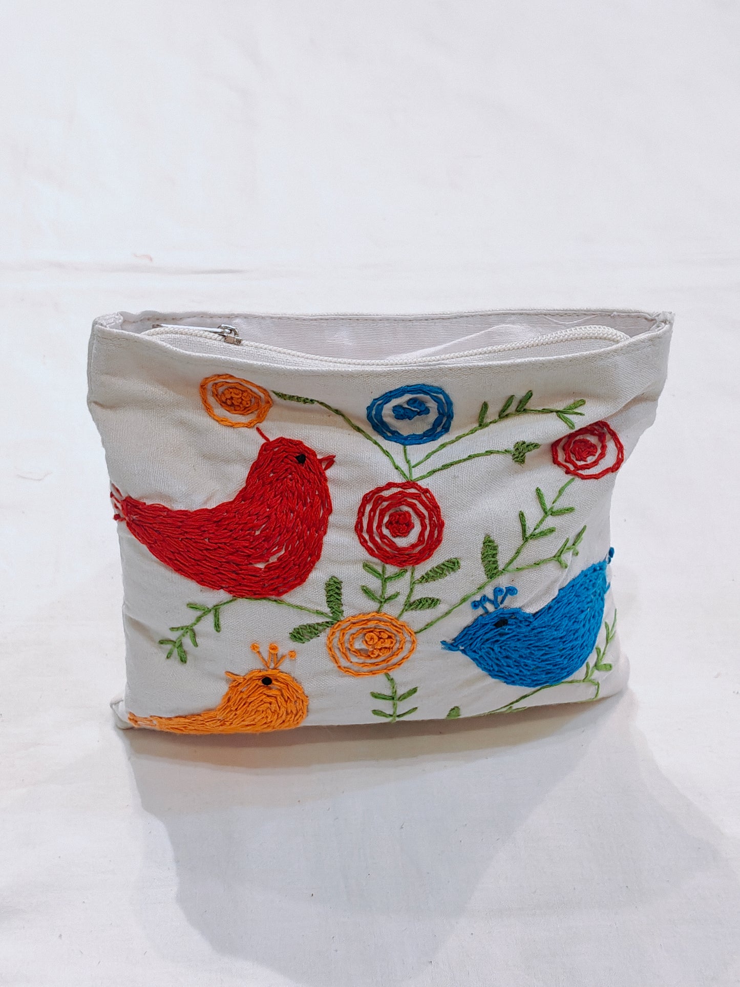 Little birdies hand embroidery on white base fabric pouch with zipper closure