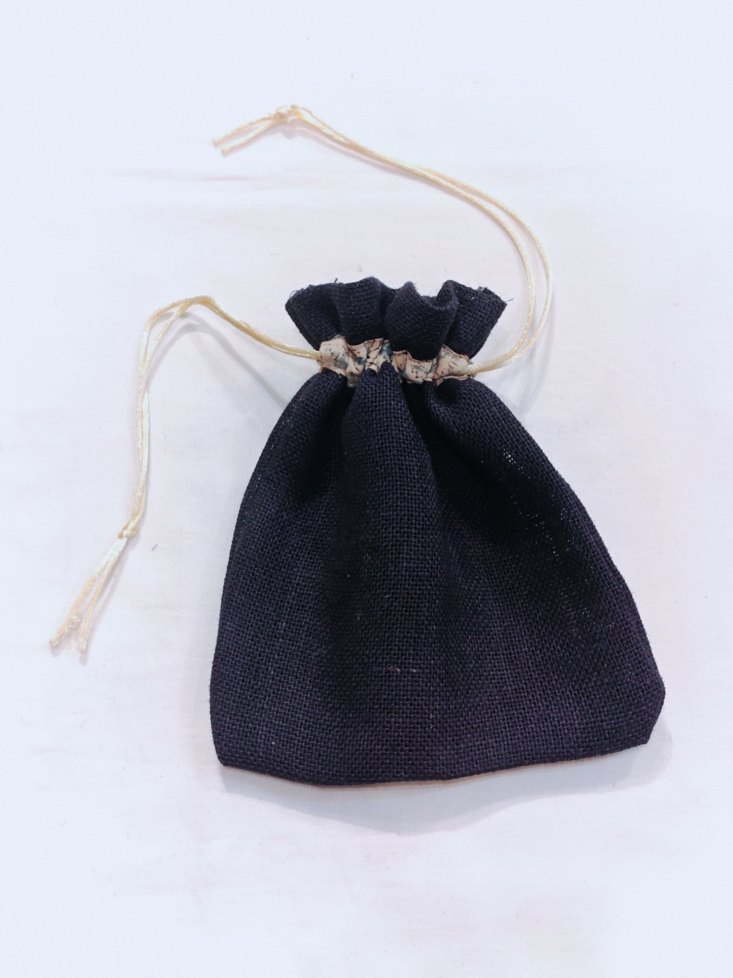 Blue jute potli with kalamkari cotton dori