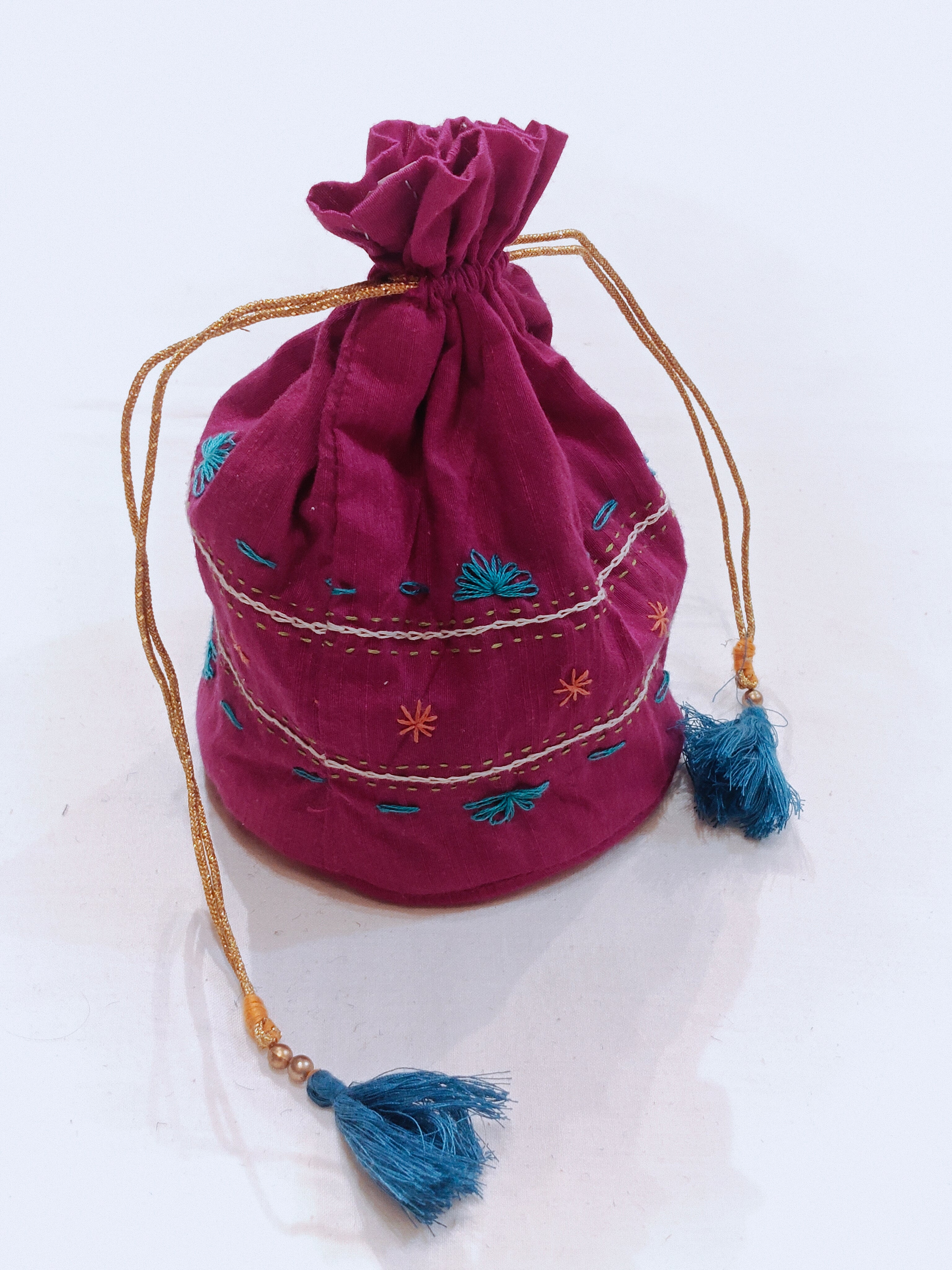Pink hand embroidered cotton potli with base – Handpicked