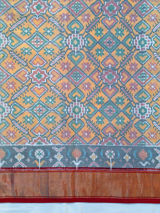 Colorful ikat silk handwoven fabric with heart patterns and zari border