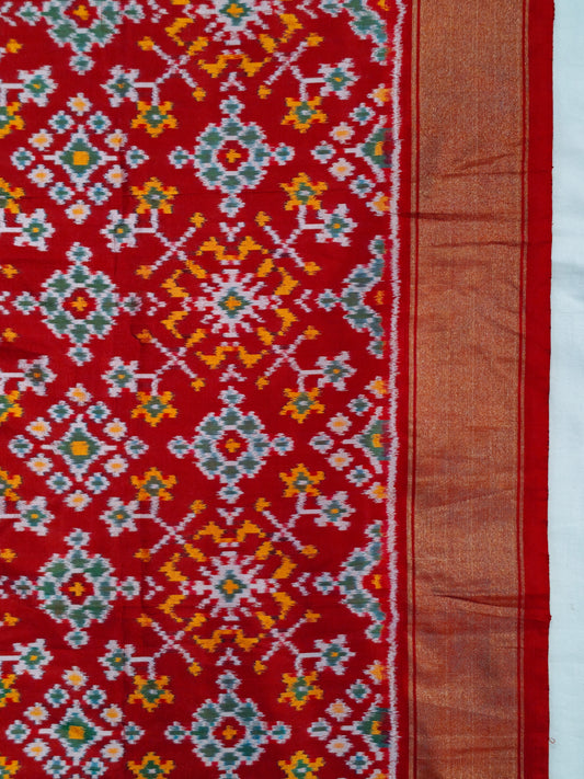 Orange and green flowers on red base ikat silk handwoven fabric with border