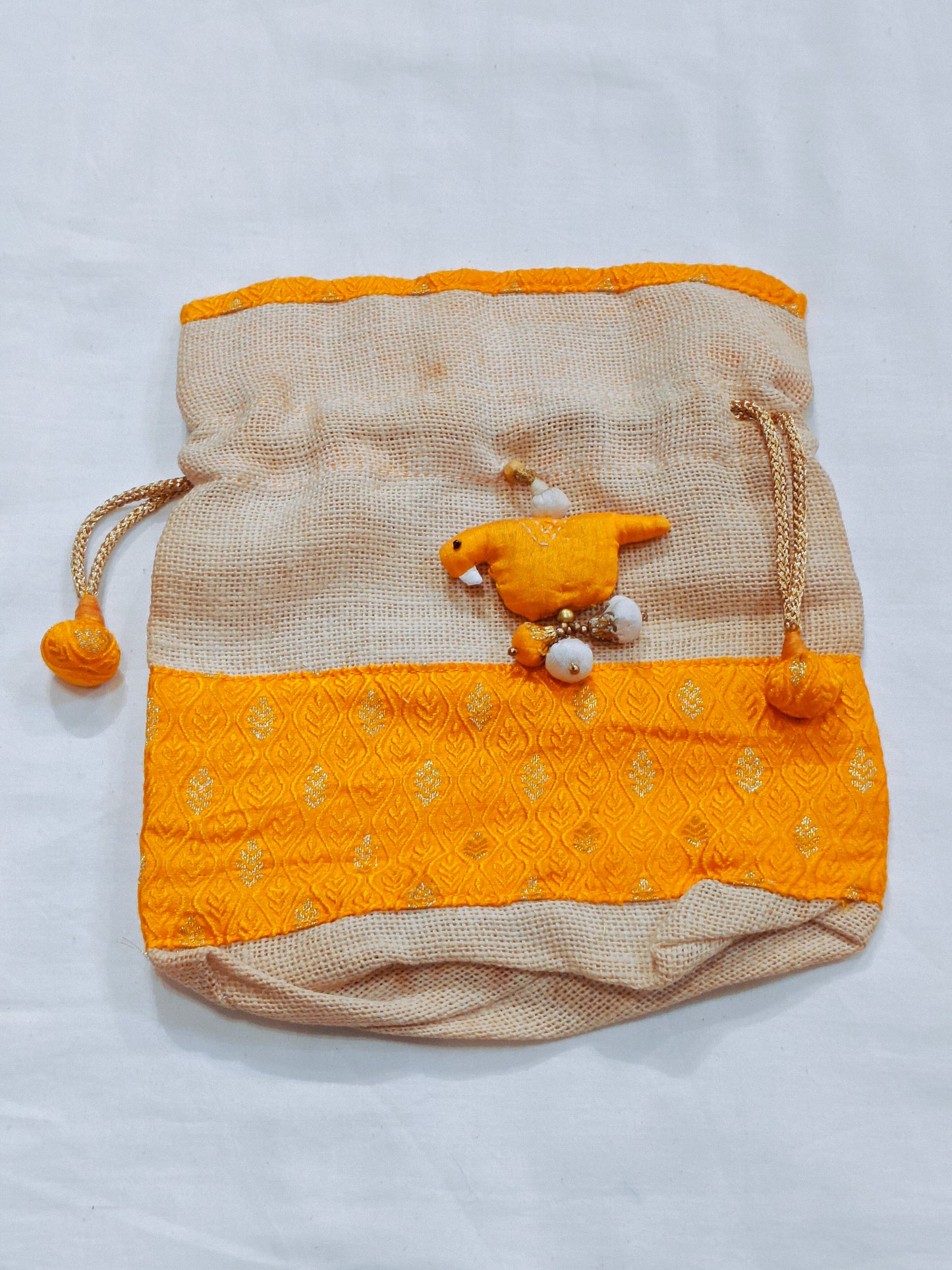 Yellow handcrafted jute banaras bag