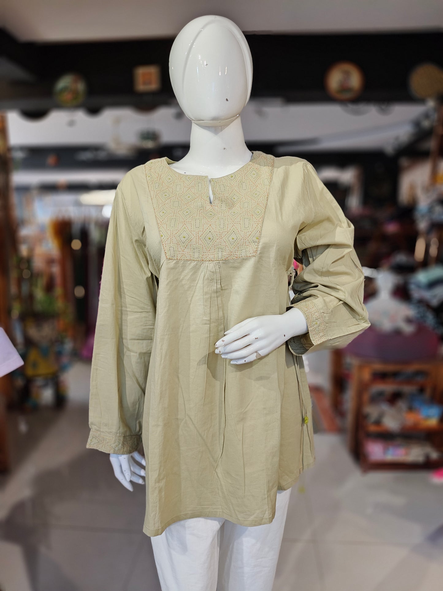 Green embroidered cotton top with waist draw string