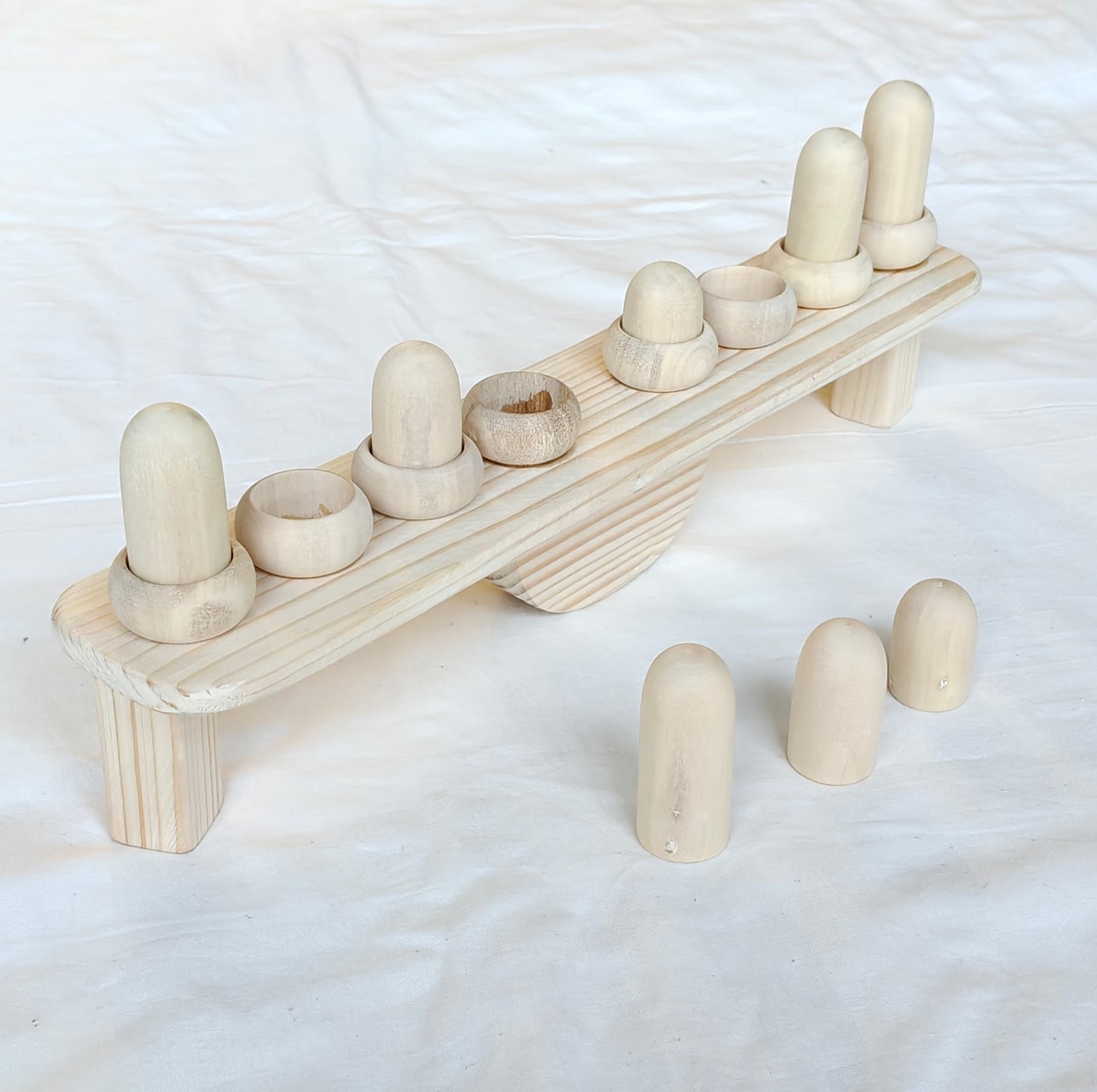 Balancing wooden toy - Conceptual learning of height, weight and colors