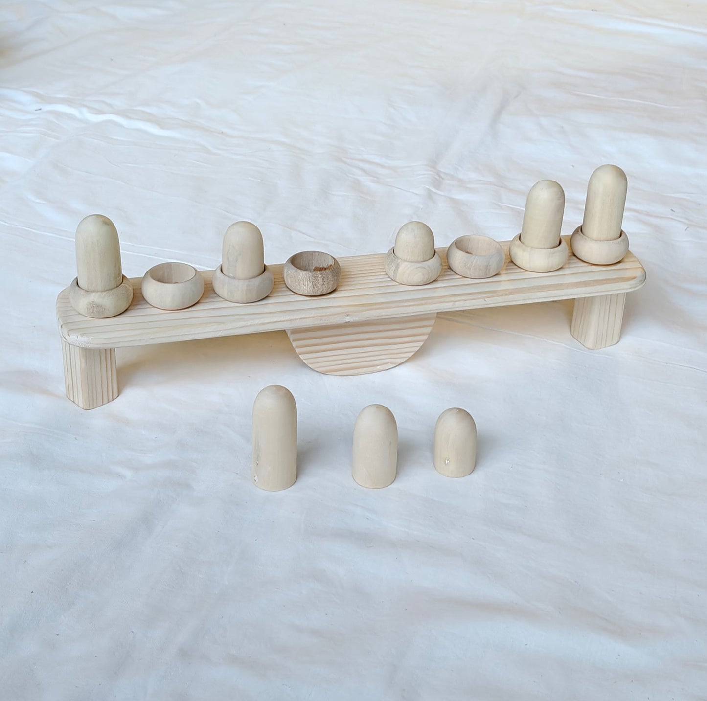 Balancing wooden toy - Conceptual learning of height, weight and colors