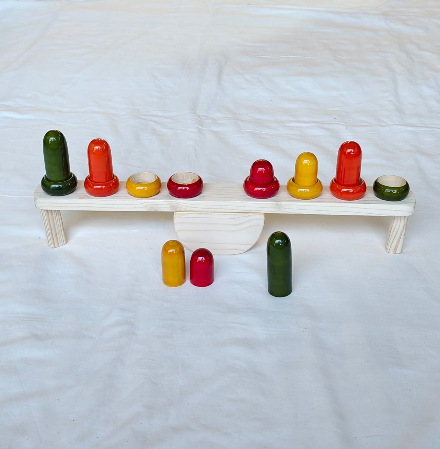 Balancing wooden toy - Conceptual learning of height, weight and colors