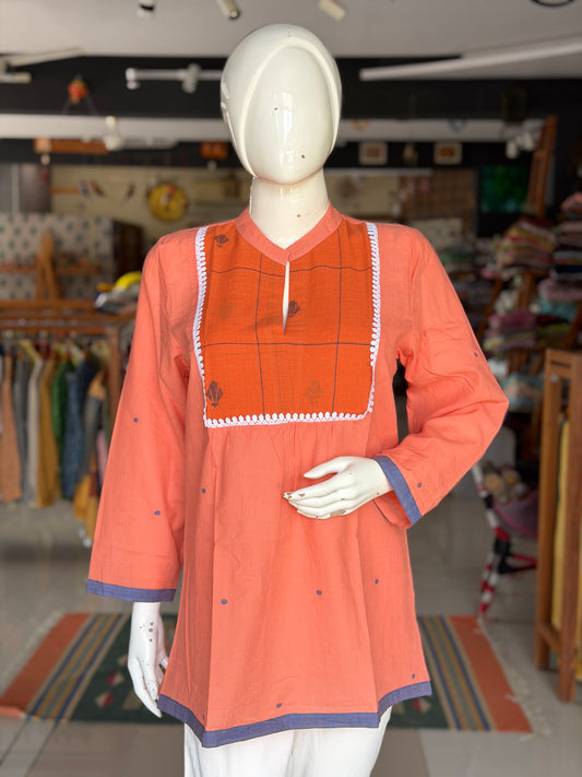 Orange dobby cotton short kurti with lace detailing