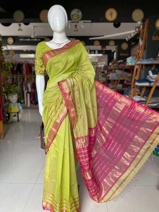 Parrot green silk cotton Maheshwari handloom saree with multiple thin stripes pink border