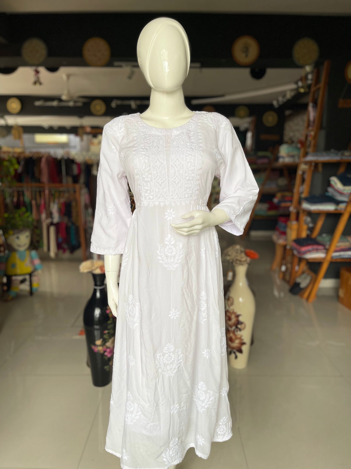 White chikankari hand embroidered rayon dress with gathers at waist and long sleeves