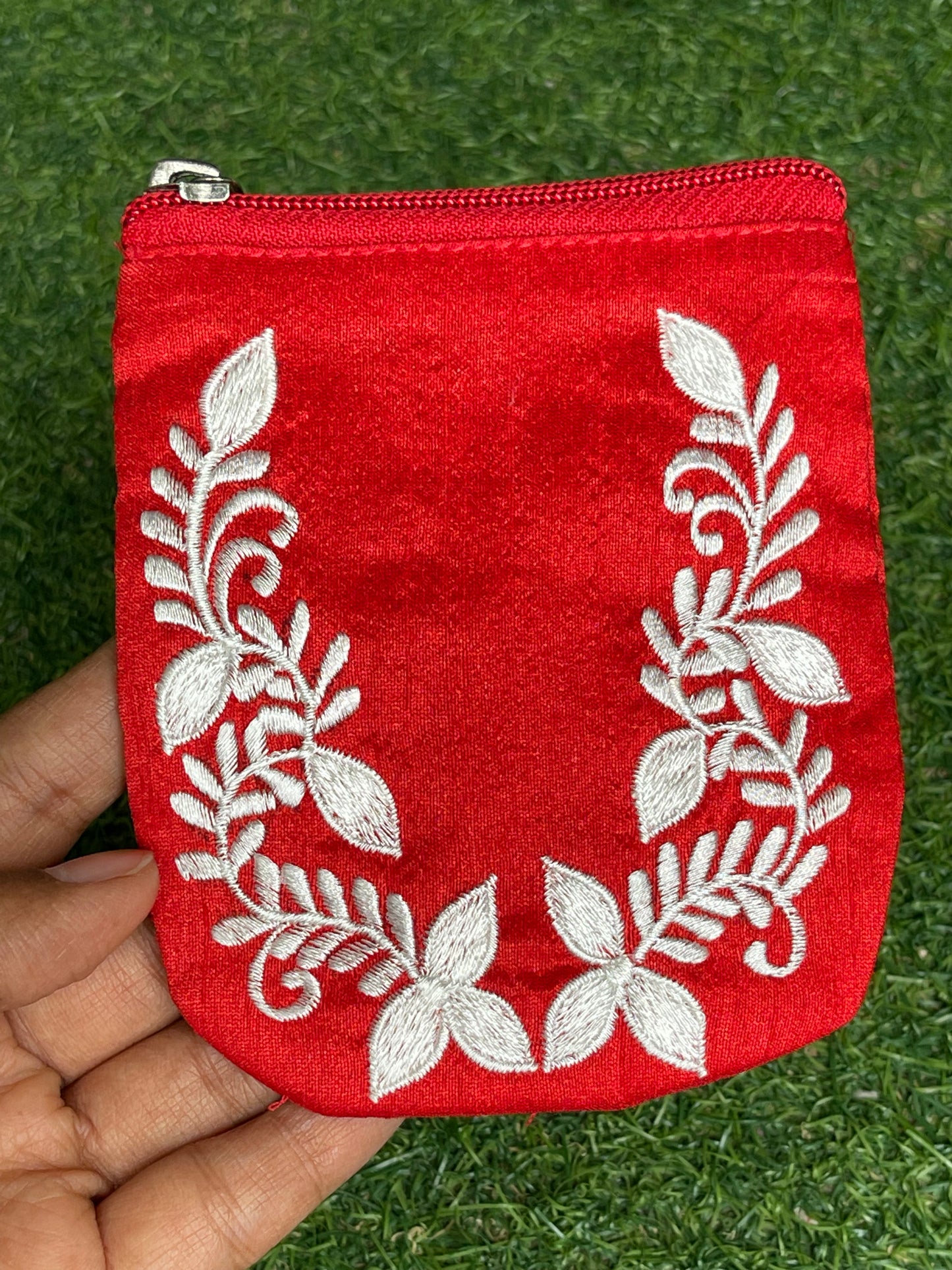 Red embroidered fabric based gifting / coin pouch with zipper closure