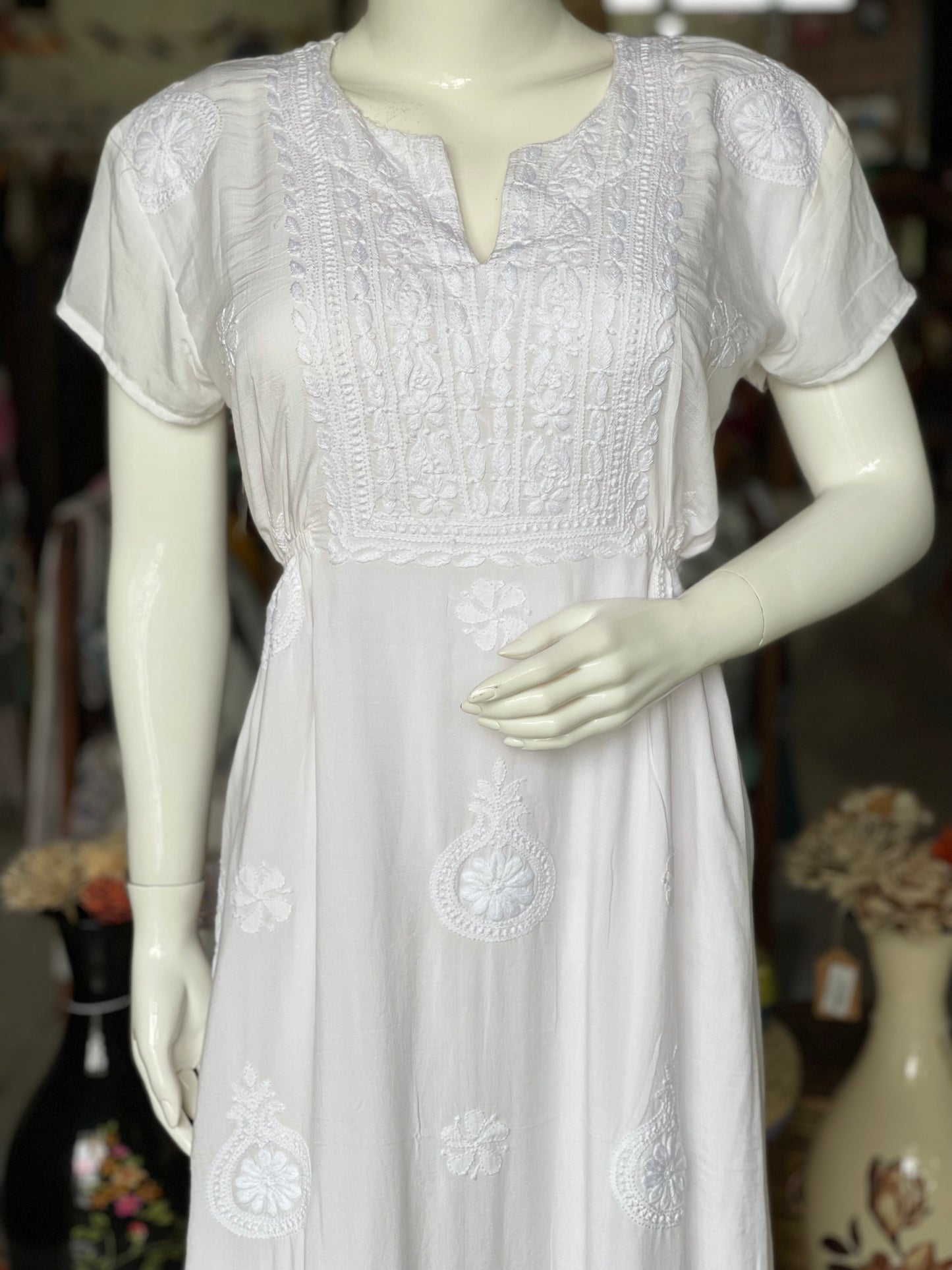 White chikankari hand embroidered rayon dress with elastic at waist and short sleeves