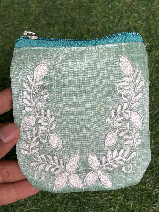 Sea green embroidered fabric based gifting / coin pouch with zipper closure