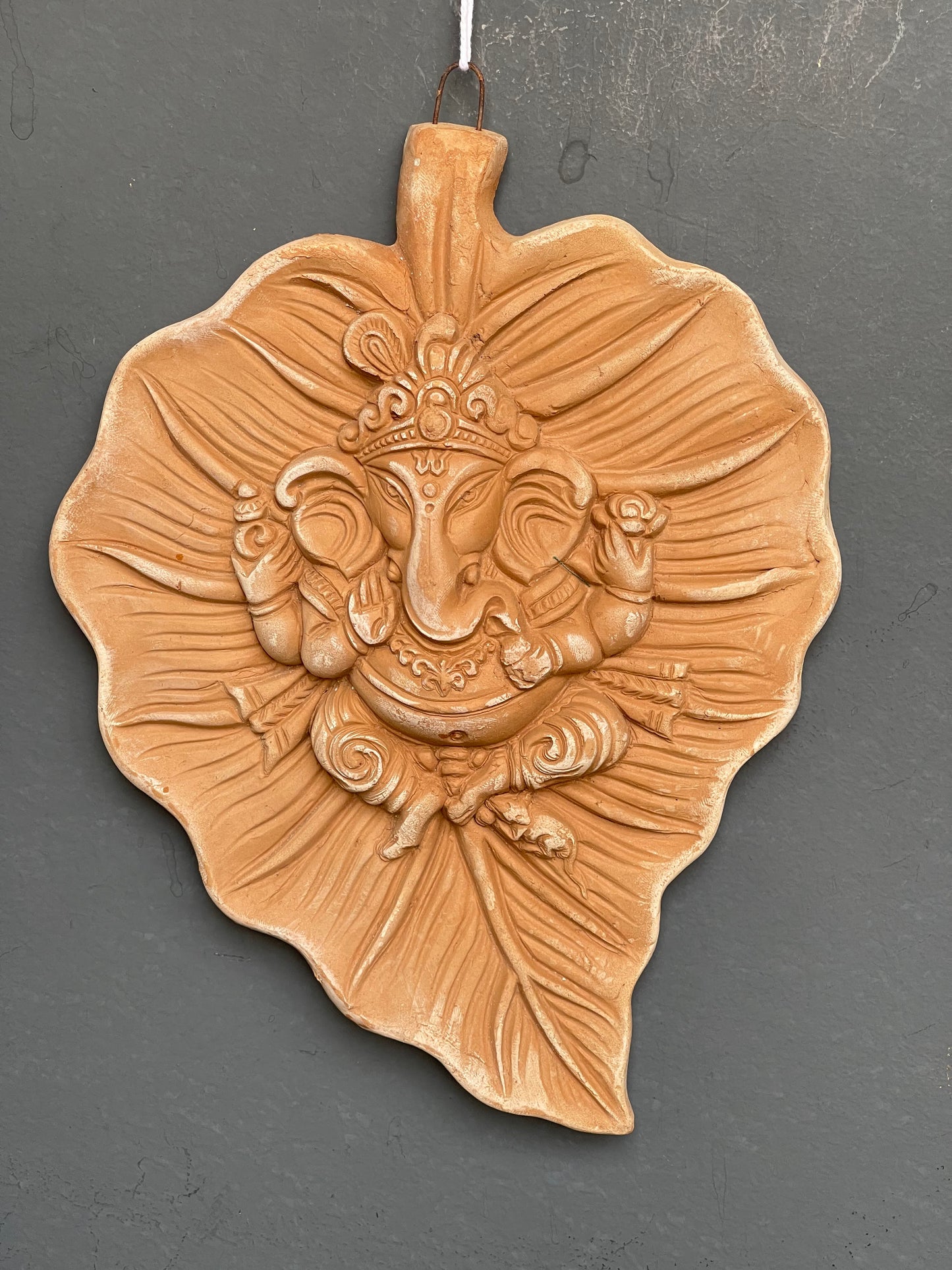 Ganesha on a leaf wall plate - handcrafted clay