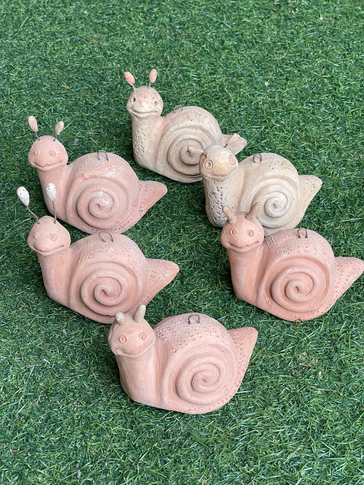 Snail in handcrafted clay with hook for hanging