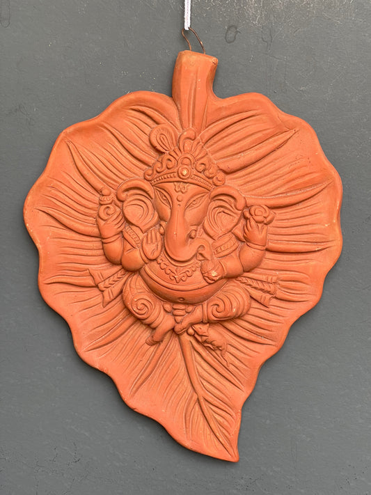 Ganesha on a leaf wall plate - handcrafted clay