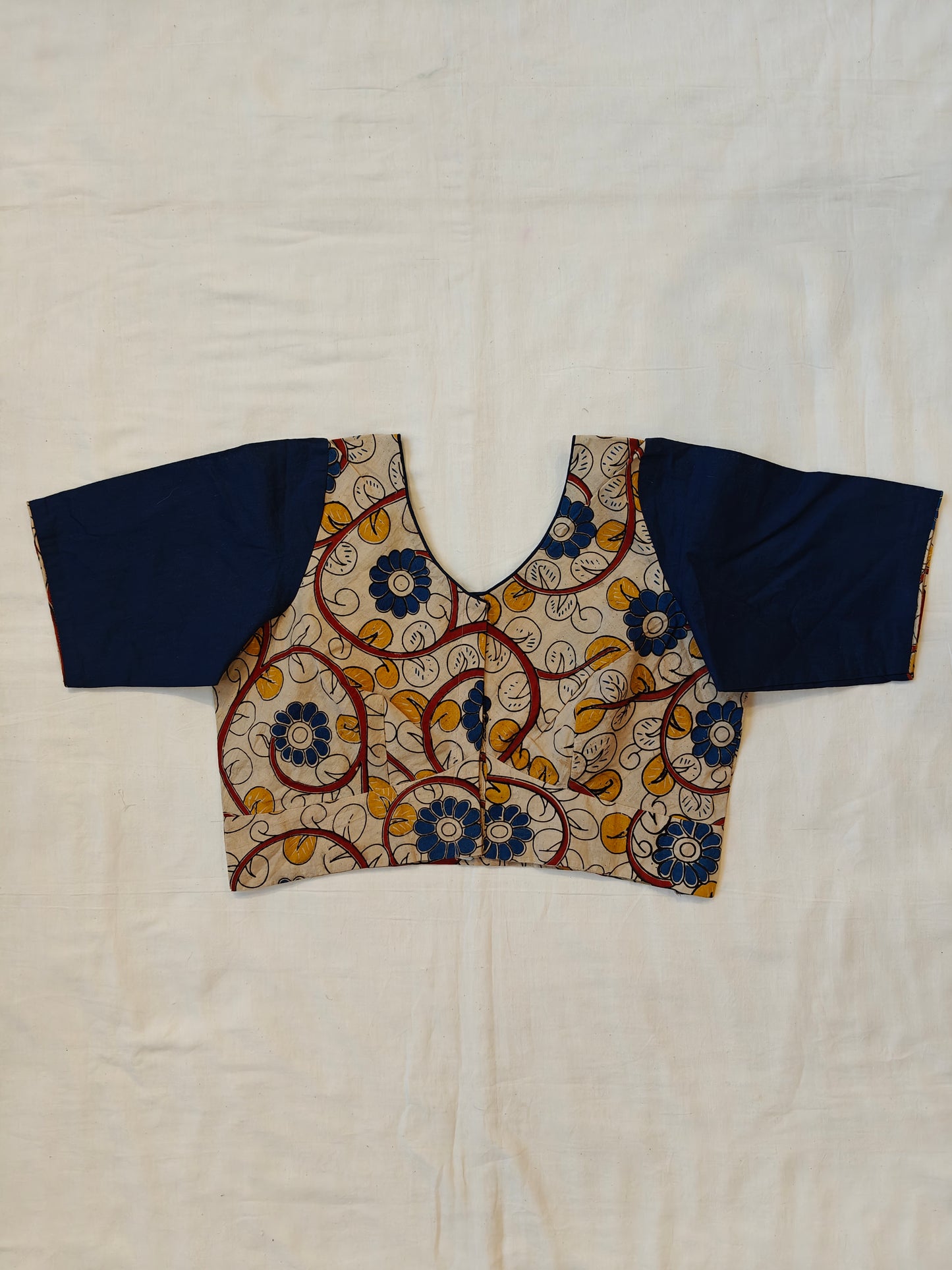 Beige Kalamkari cotton with plain blue sleeves blouse