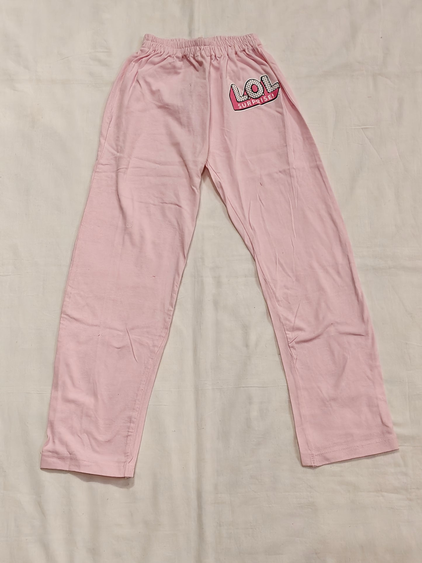 Pink cotton track pants with LOL print for girls