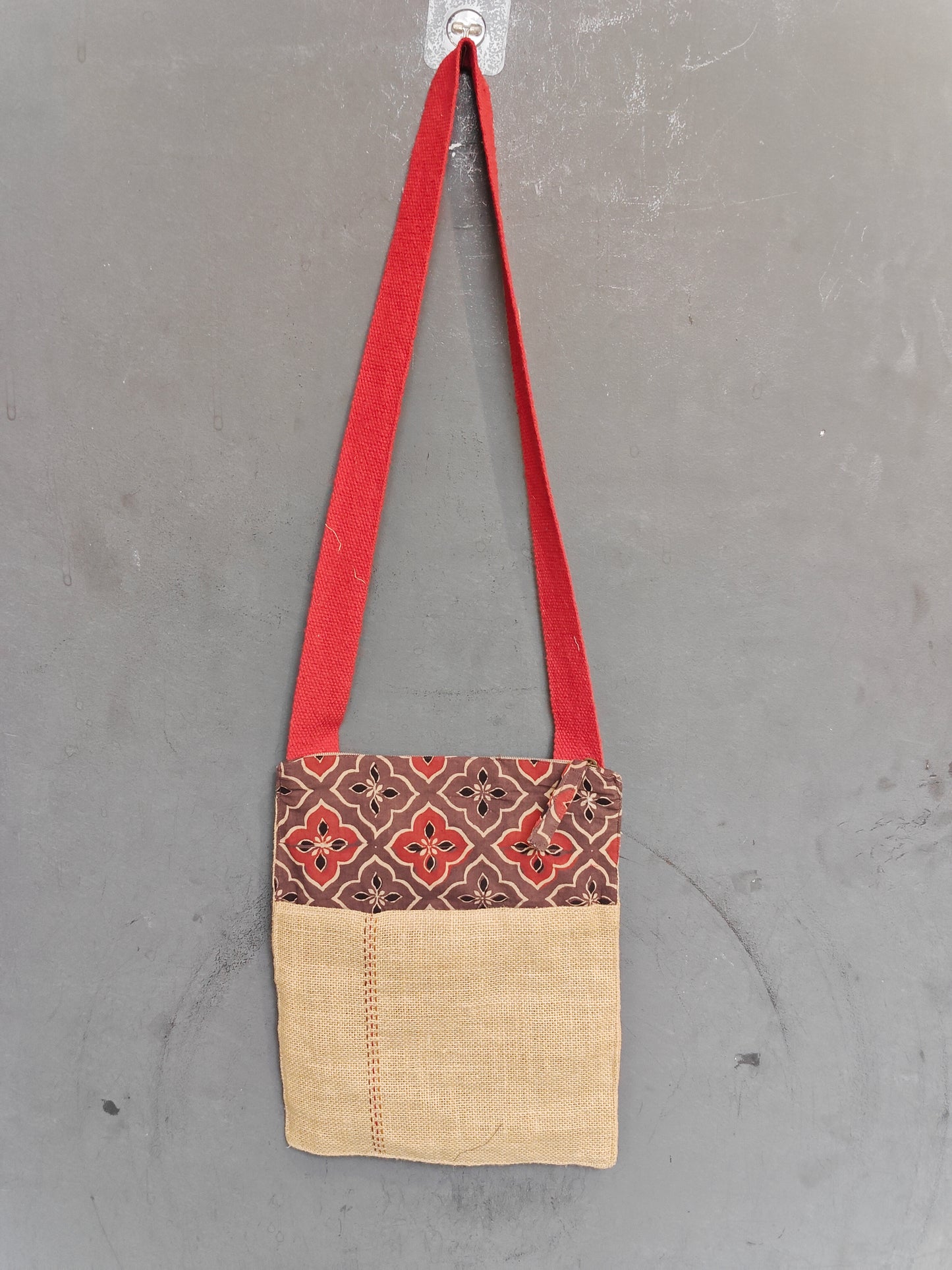 Handmade crossbody sling bag with multicolour fabric panels and jute
