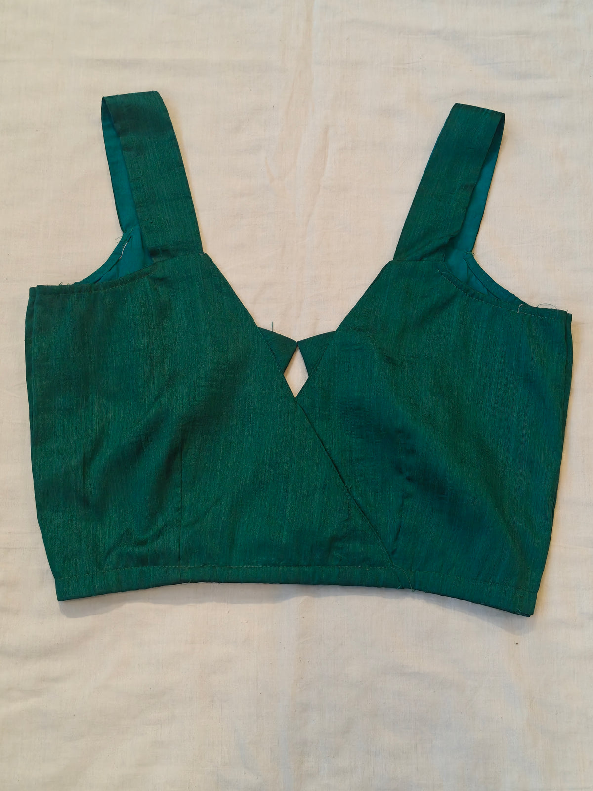 Green raw silk sleeveless blouse with crossover V-neck - back open